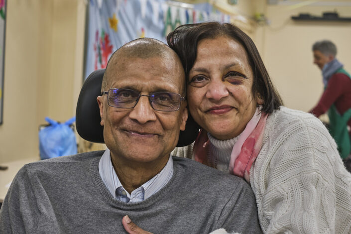 Couple with man in a wheelchair