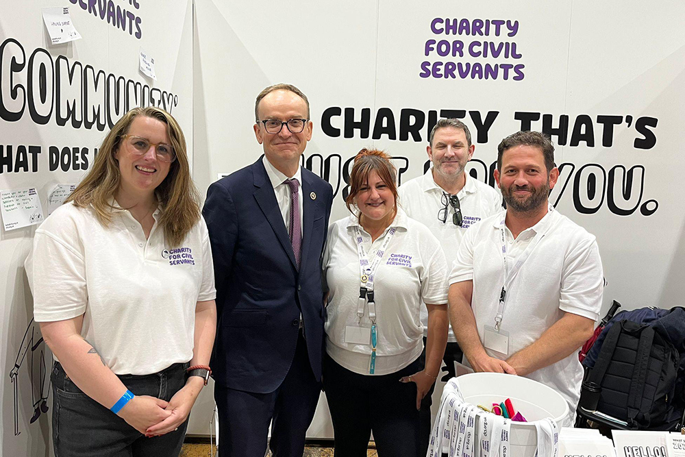 Charity for Civil Servants staff alongside Jeremy Pocklington