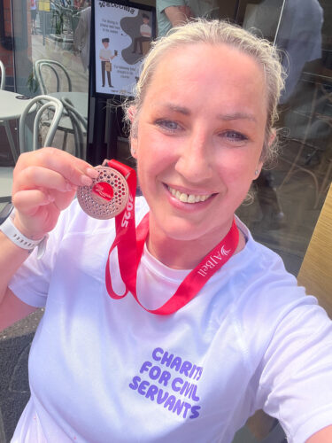 Marie completing the Manchester Half Marathon
