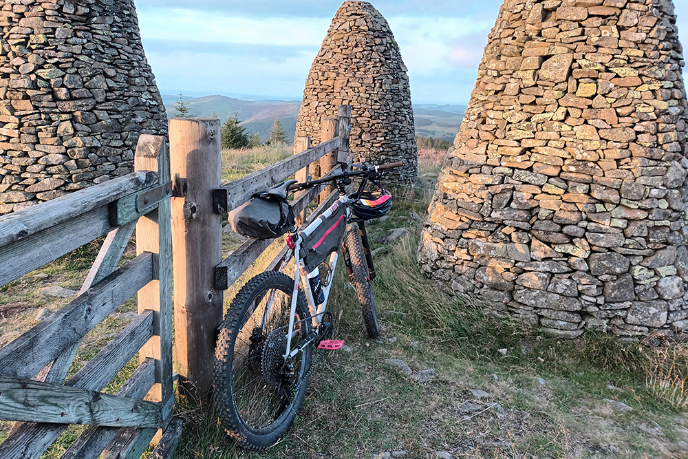 Photo of John's bike leaning against a fence