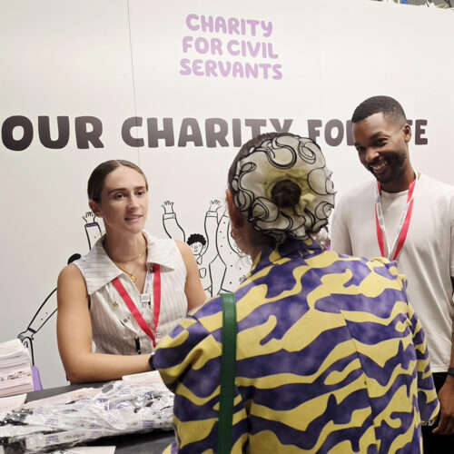 Members of staff from the Charity for Civil Servants at the stand at Civil Service Live London