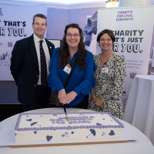 Jonathan Freeman CEO, Sandra Elmy longest serving employee and Jo Shanmugalingam, Chair of Trustees