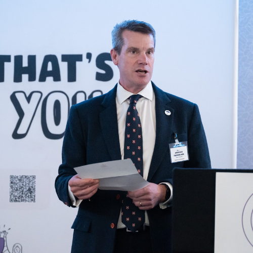 Jonathan Freeman CEO speaking at the event