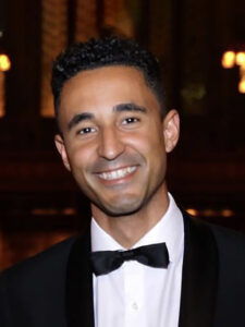 Photo of Anton Constantinou, CarersUK wearing a tuxedo