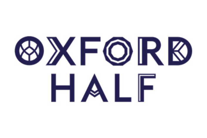 Oxford Half Marathon logo with the words Oxford Half in capital letters
