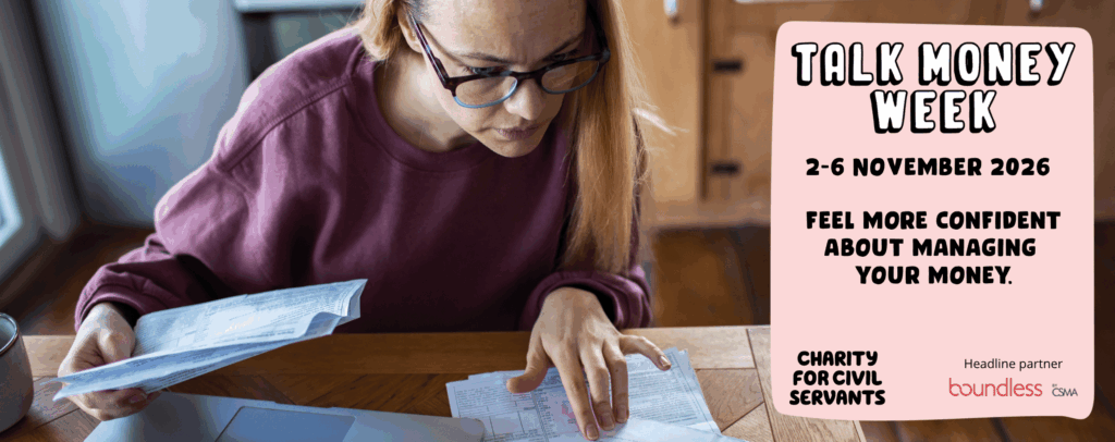 Stock image of a woman in her 30s with long hair and wearing a burgundy jumper looking at financial papers with the wording 'Talk Money Week / 2-6 November / Feel more confident about managing your money / Headline partner with Boundless'